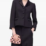 Pink bag worn by a person, showing the bags fit