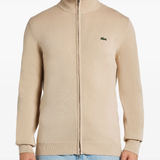 Tan sweater worn by a person, showing the sweater fit