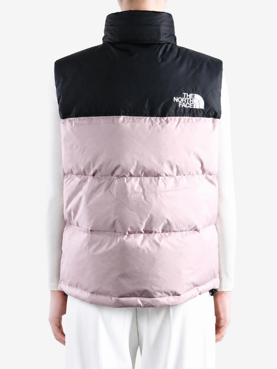 Pink top worn by a person, showing the top fit
