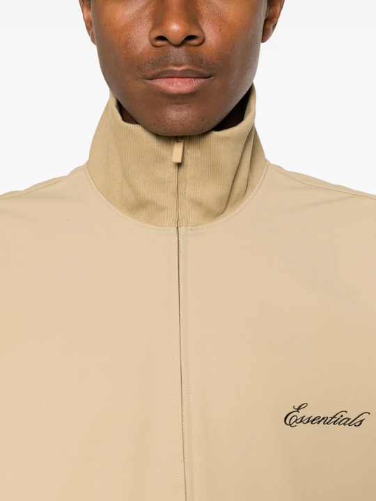 Close up of tan coats, showing texture of the blended fabric