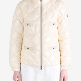 White jacket worn by a person, showing the jacket fit