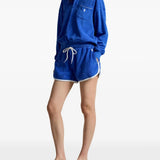 Blue top, full body view