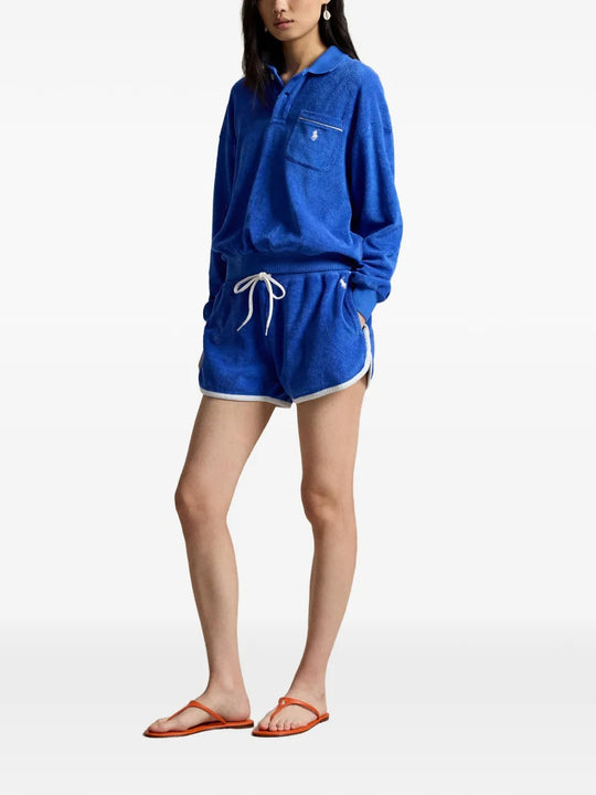 Blue top, full body view