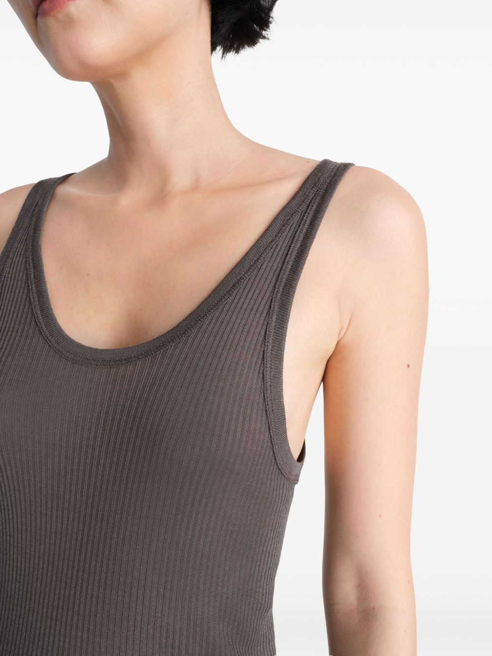 Close up of brown top, showing texture of the viscose and silk fabric