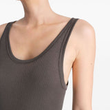 Close up of brown top, showing texture of the viscose and silk fabric