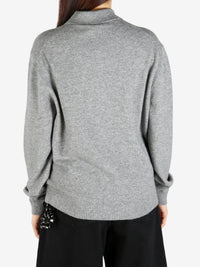 Grey knitwear, back view