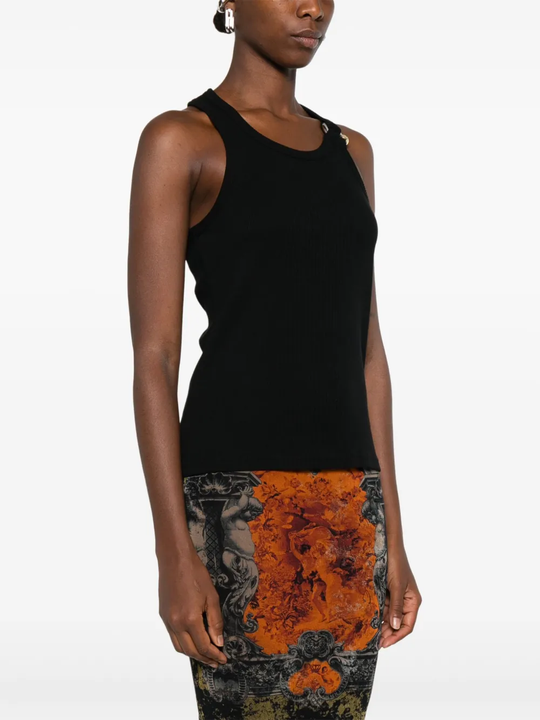 Black top worn by a person, showing the top's fit