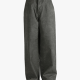 Grey pants worn by a person, showing the pants' fit