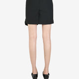 Black skirt worn by a person, showing the skirt's fit