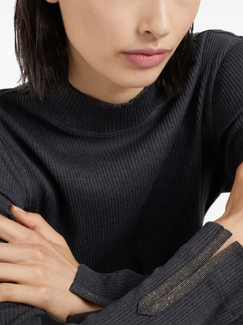 Close up of grey tops, showing texture of the cotton fabric