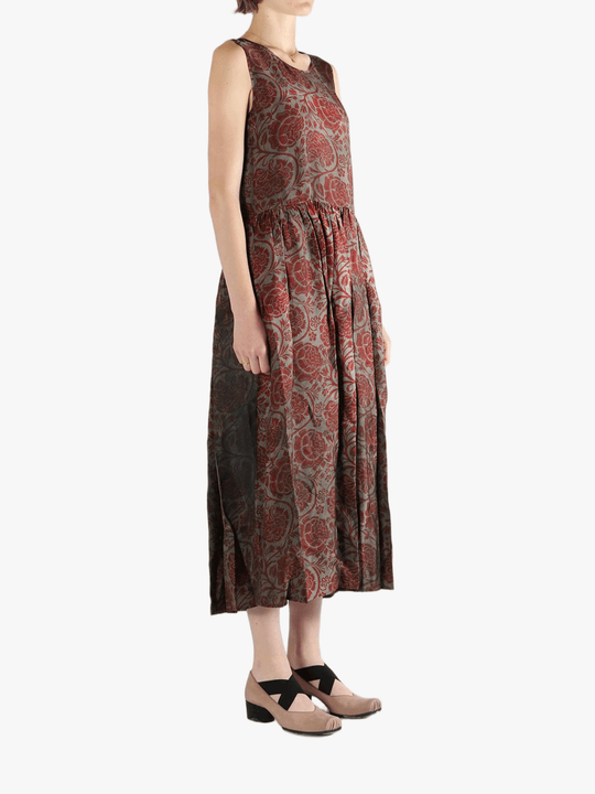 Red dress worn by a person, showing the loose fit.