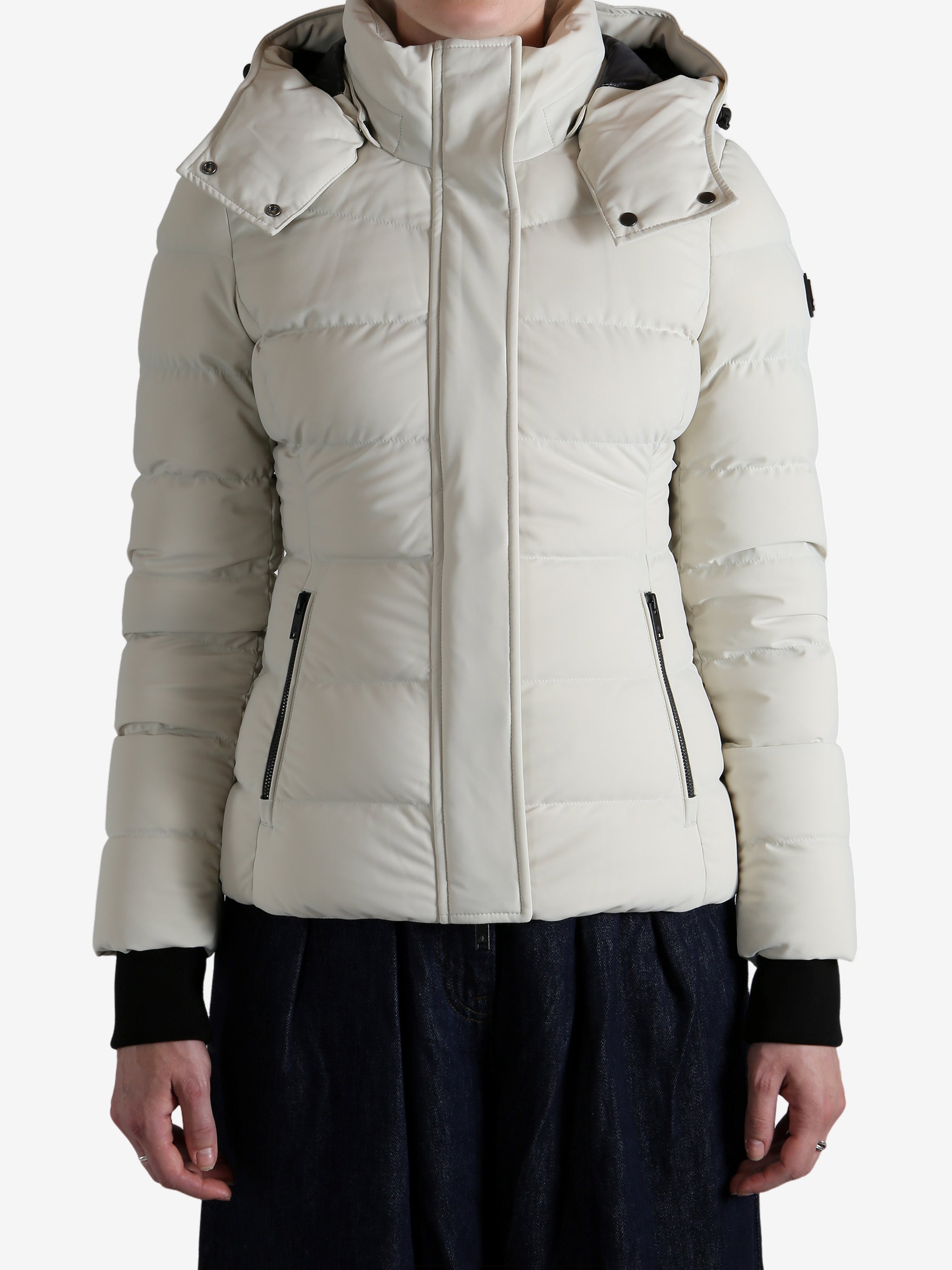 White jacket worn by a person, showing the jacket's fit