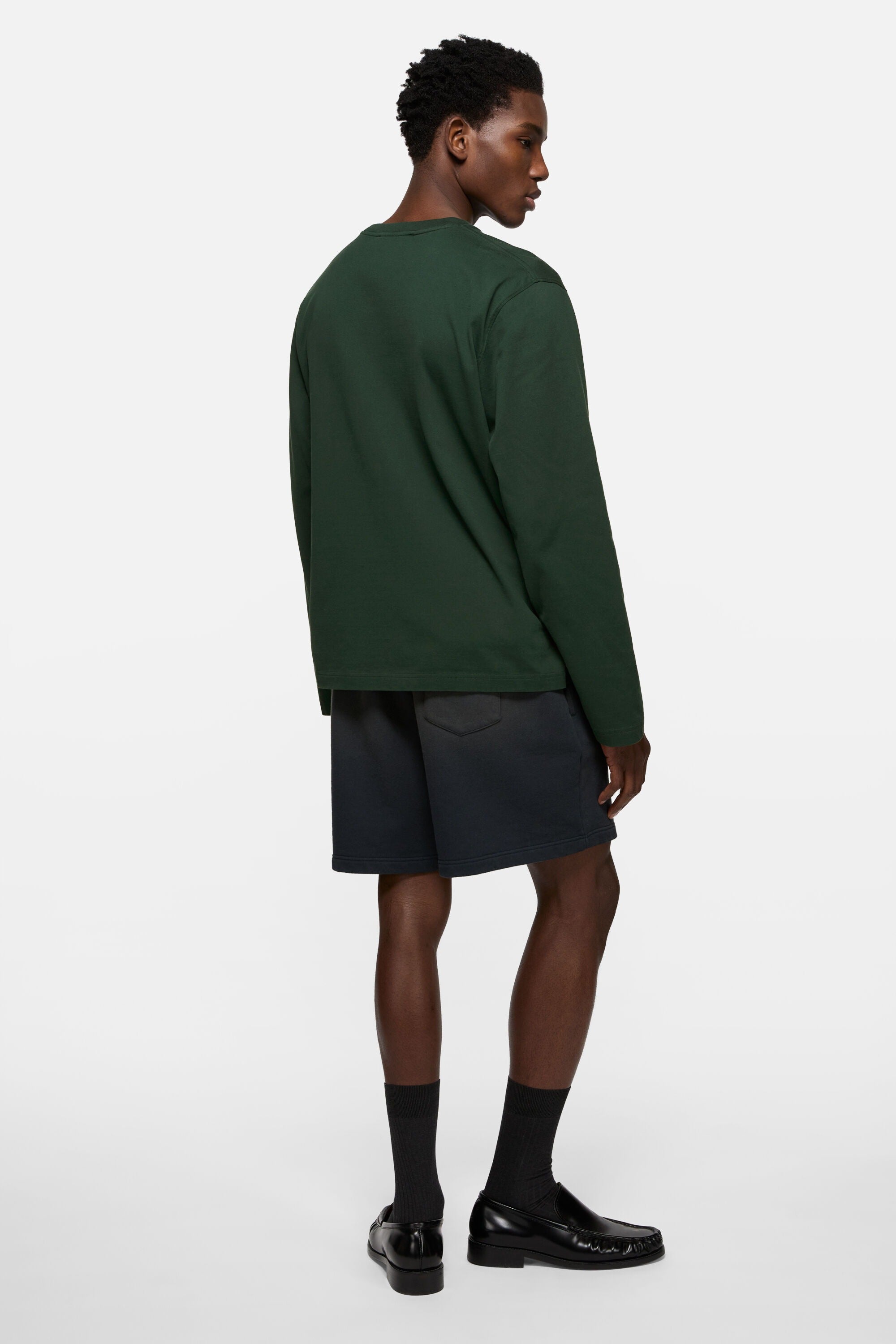 Green t-shirt, full body view