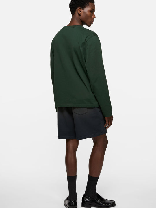 Green t-shirt, full body view