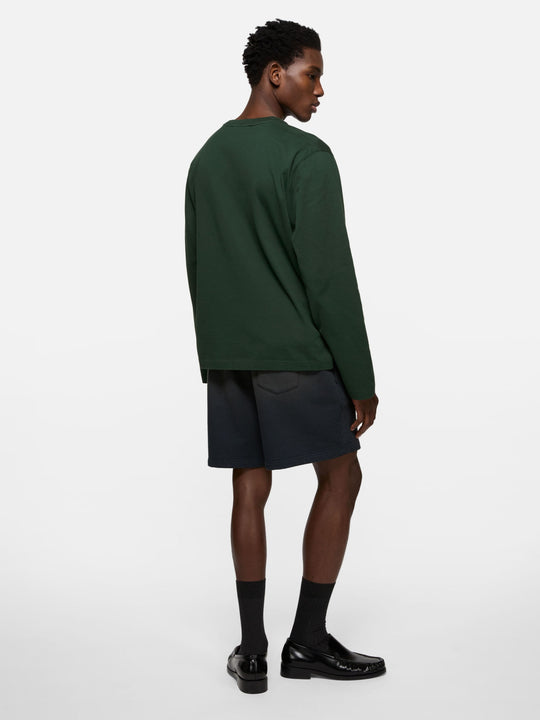 Green t-shirt, full body view