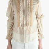 Tan t-shirt worn by a person, showing the t-shirt's fit