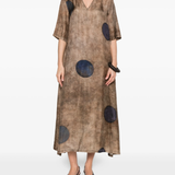 Brown dress worn by a person, showing the dress's fit