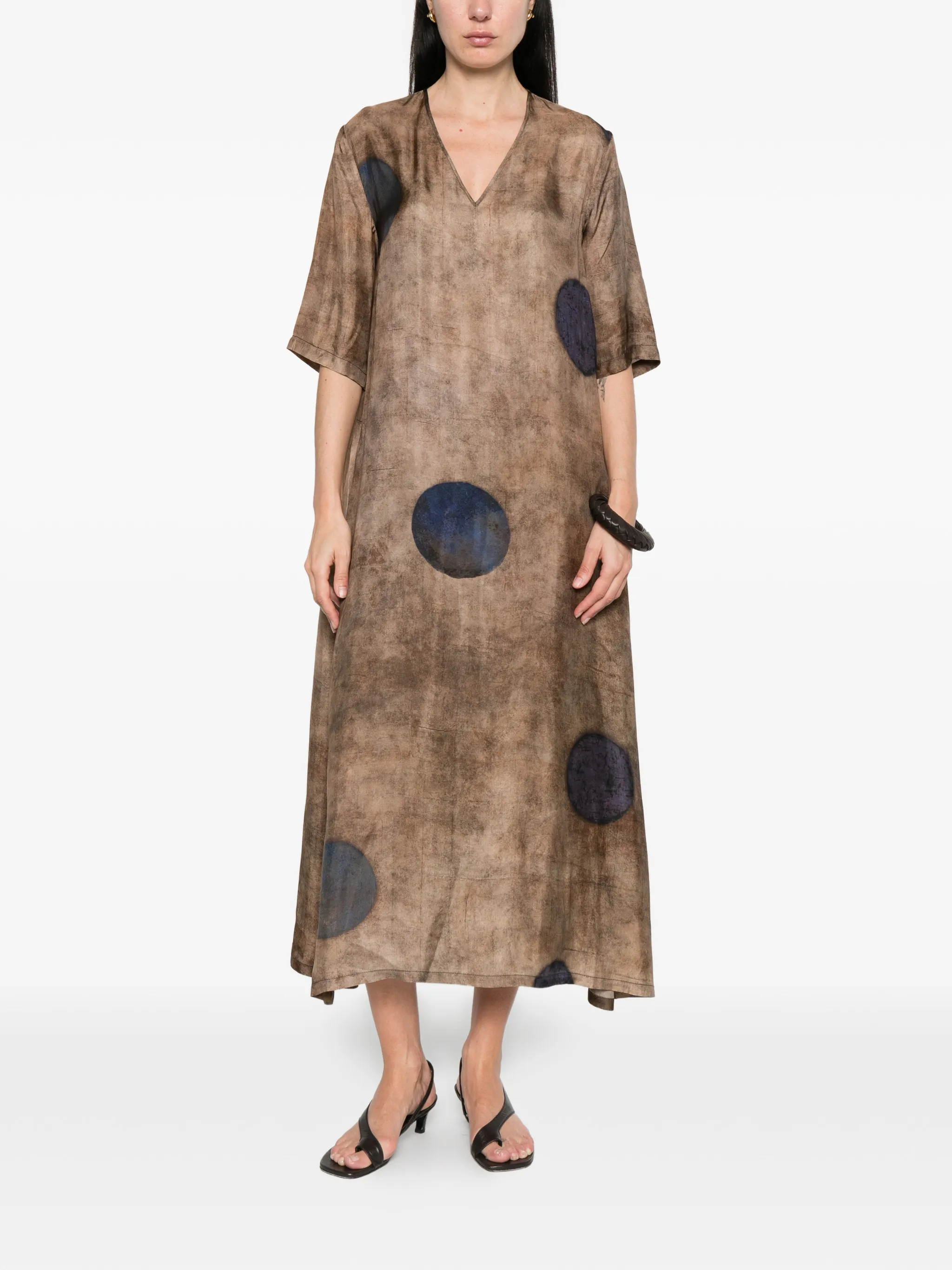 Brown dress worn by a person, showing the dress's fit