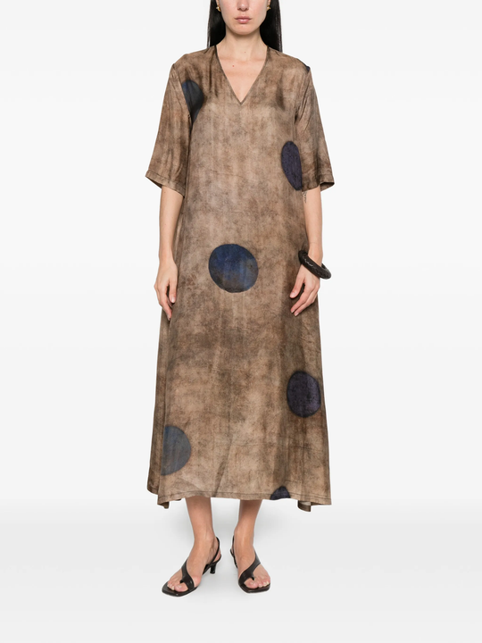 Brown dress worn by a person, showing the dress's fit