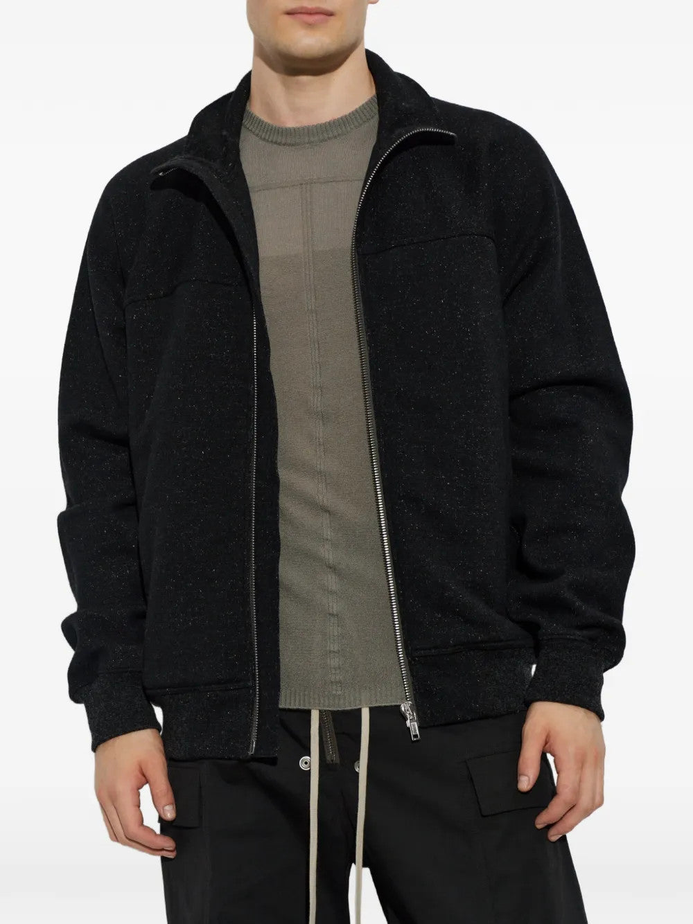 Black hoodie worn by a person, showing the hoodie fit