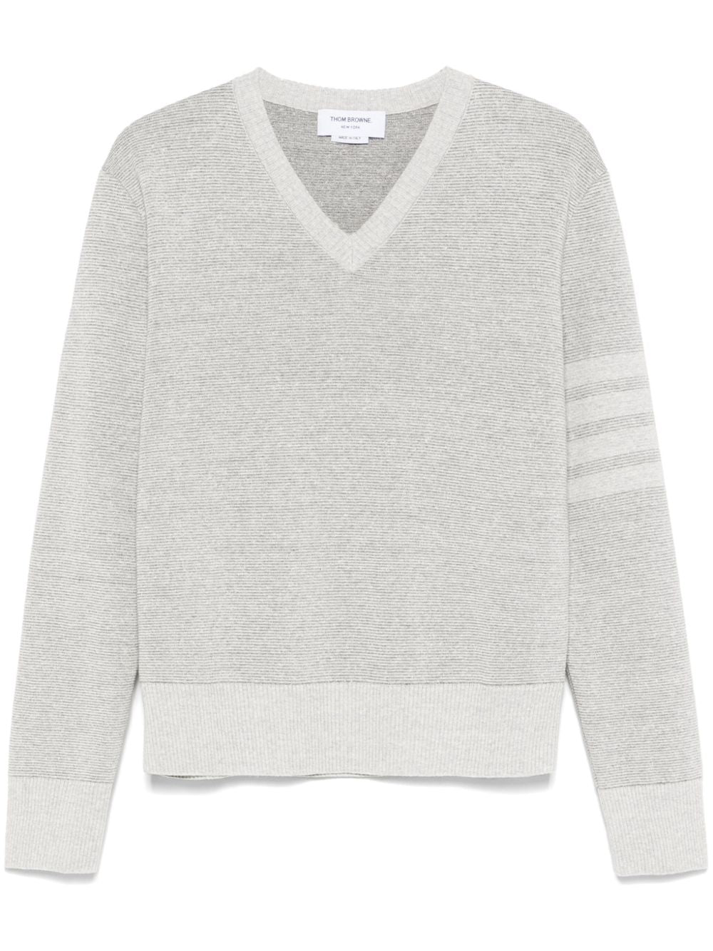 Grey knitwear, front view