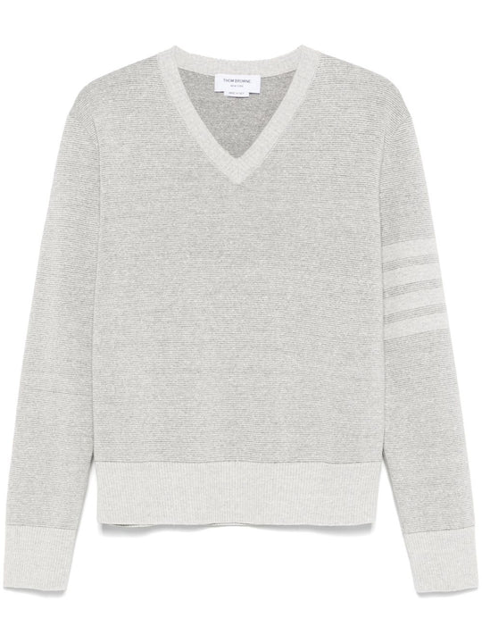 Grey knitwear, front view