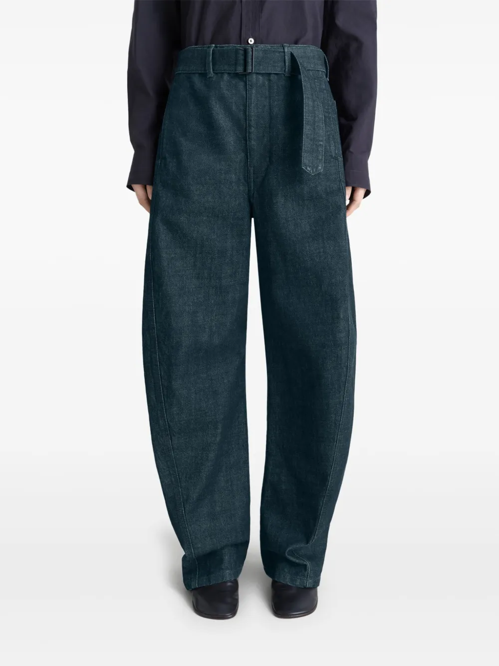 Navy pants worn by a person, showing the pants fit