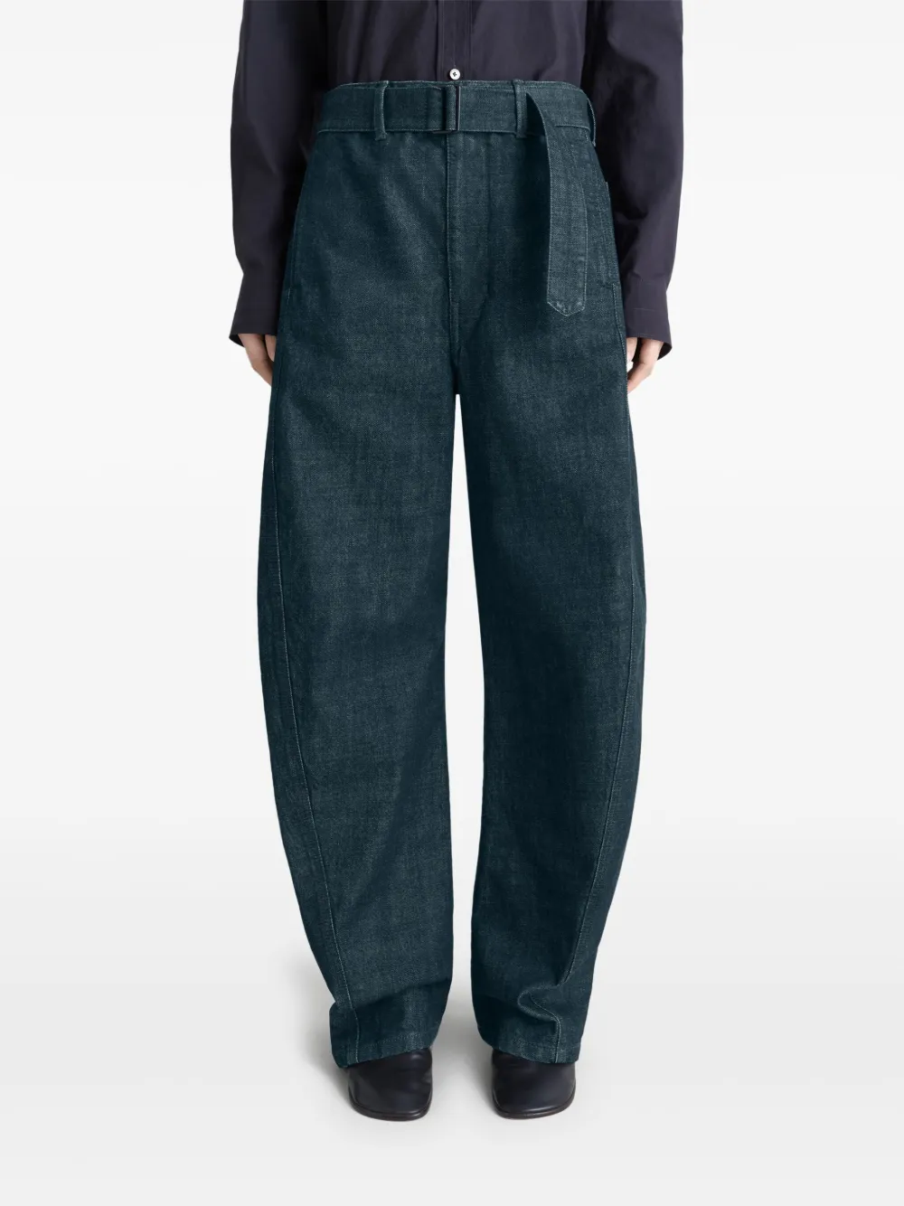 Navy pants worn by a person, showing the pants fit