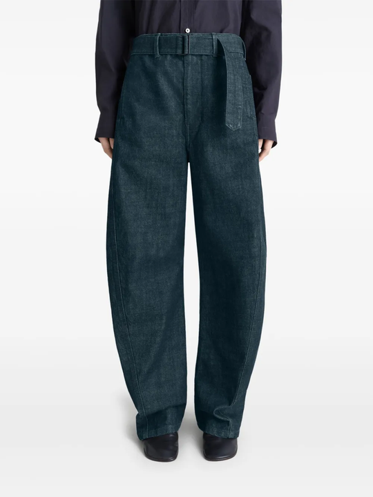 Navy pants worn by a person, showing the pants fit