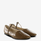 Tan flats, side view