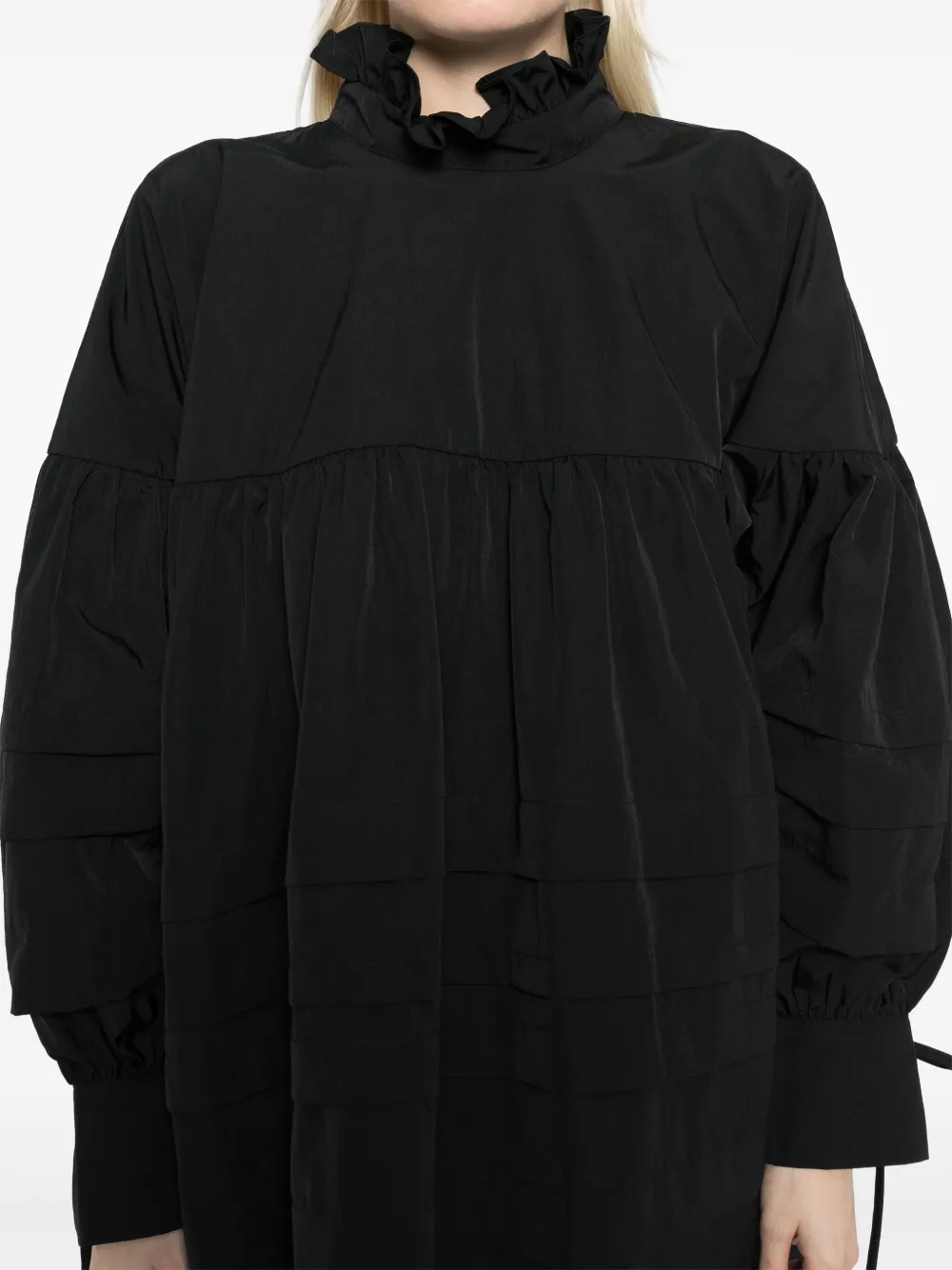 Close up of black dress,showing texture of the cotton fabric