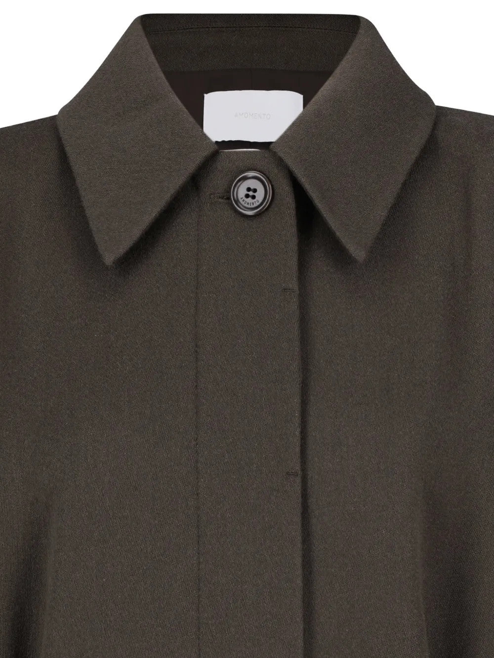 Close up of Brown jacket, showing texture of the 51% rayon/ 45% cotton/ 4% polyurethane fabric