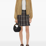 Black bag worn by a person, showing the bag's fit