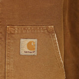 Close up of Brown jacket, showing texture of the 100% organic cotton made fabric