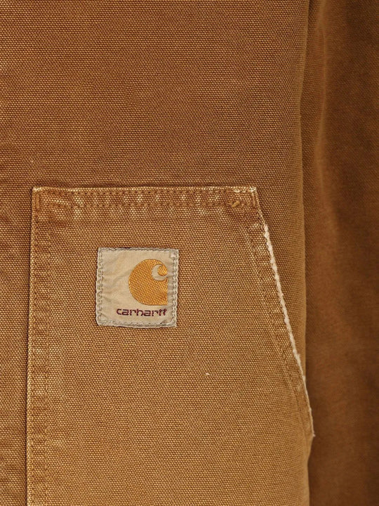 Close up of Brown jacket, showing texture of the 100% organic cotton made fabric