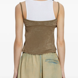 Brown top worn by a person, showing the top's fit