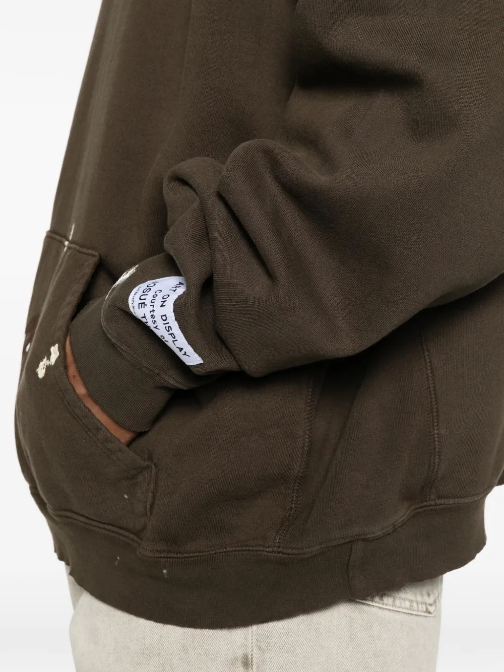Close up of brown hoodies, showing texture of the cotton fabric