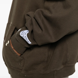 Close up of brown hoodies, showing texture of the cotton fabric