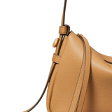 Close up of brown bags, showing texture of the blended fabric