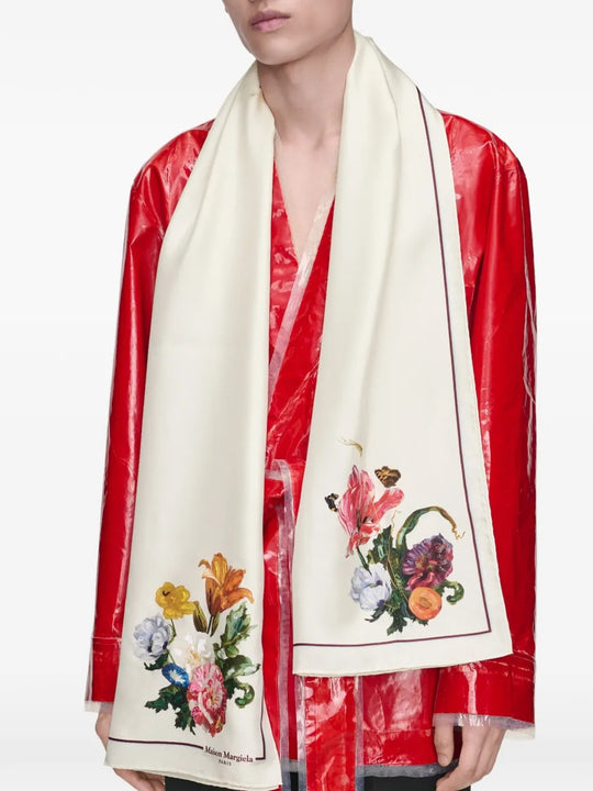 White scarf worn by a person, showing the scarf fit