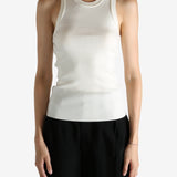 Tan top worn by a person, showing the top fit