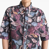 Close up of black shirt, showing texture of the cotton fabric