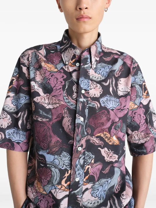 Close up of black shirt, showing texture of the cotton fabric