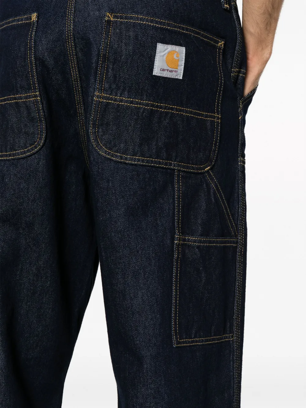Close up of black pants, showing texture of the cotton fabric