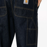 Close up of black pants, showing texture of the cotton fabric