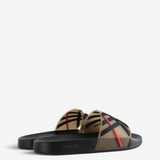 Tan sandals, side view
