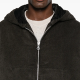 Close up of brown jackets, showing texture of the fabric