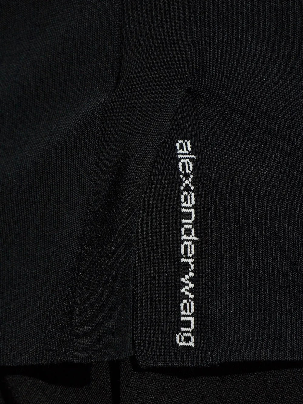 Close up black top, showing texture of the cotton fabric