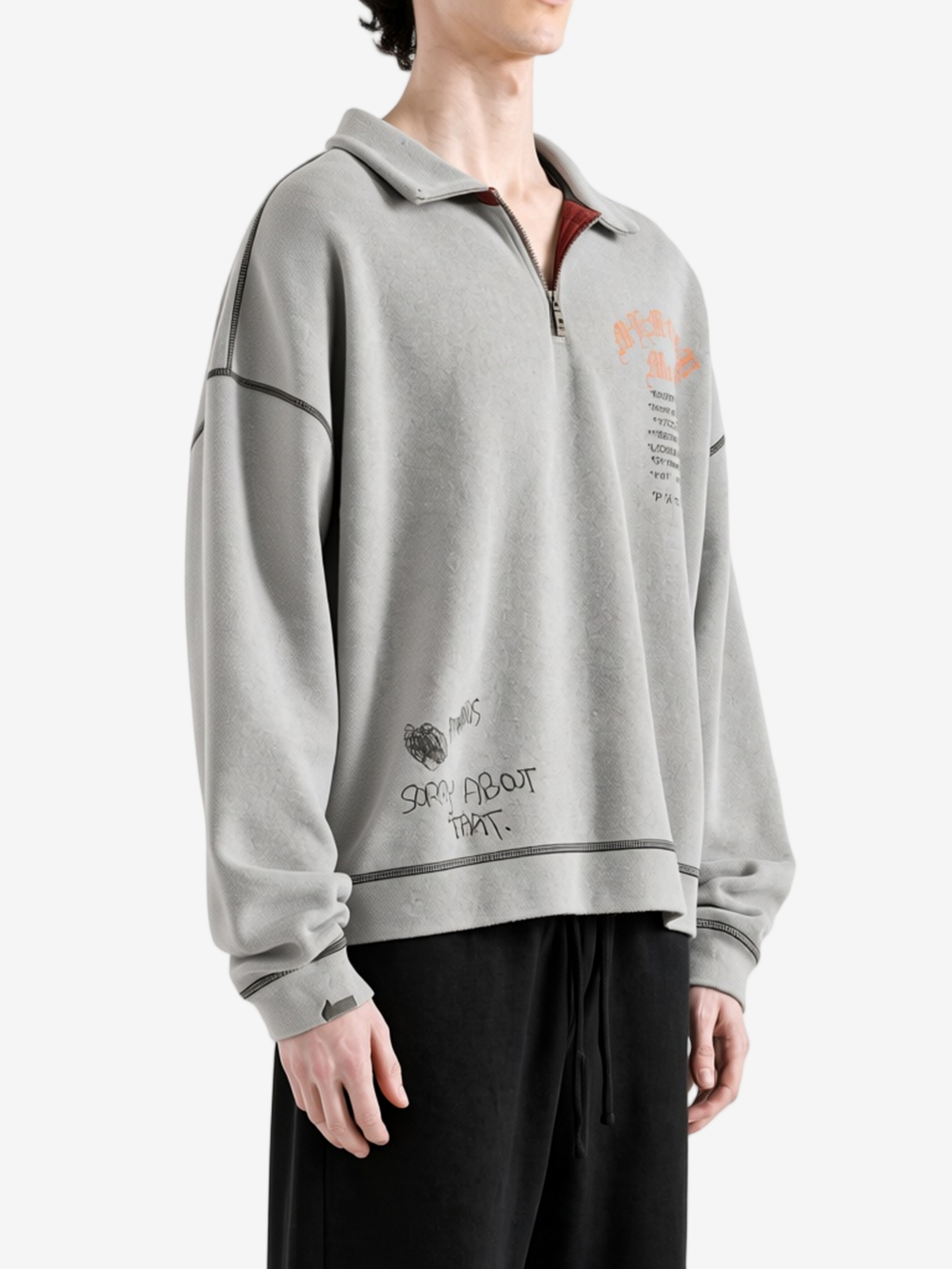 Grey hoodie worn by a person, showing the hoodie fit