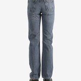 Grey pants worn by a person, showing the pants fit